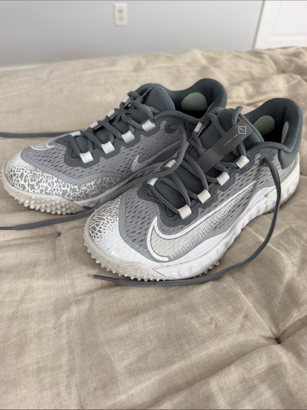 Nike Grey and White turf sneakers